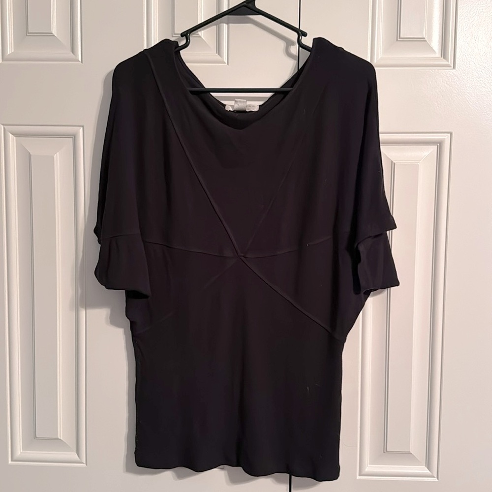 Kenar knit black top with cross pattern and tapered waist. Size L